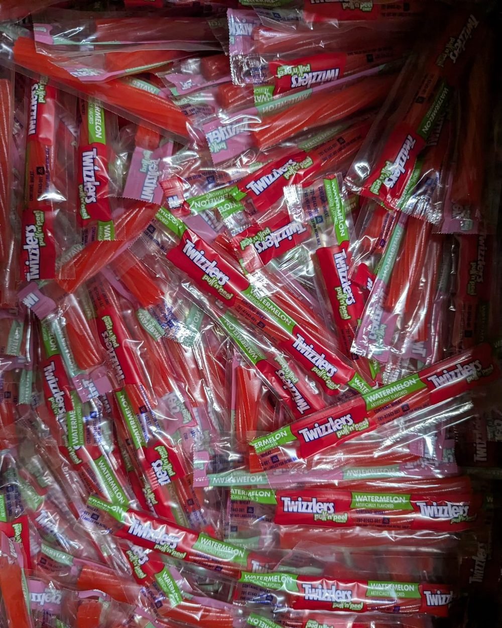 Bulk Twizzlers Pull 'n' Peel watermelon candy, chewy excess candy inventory
