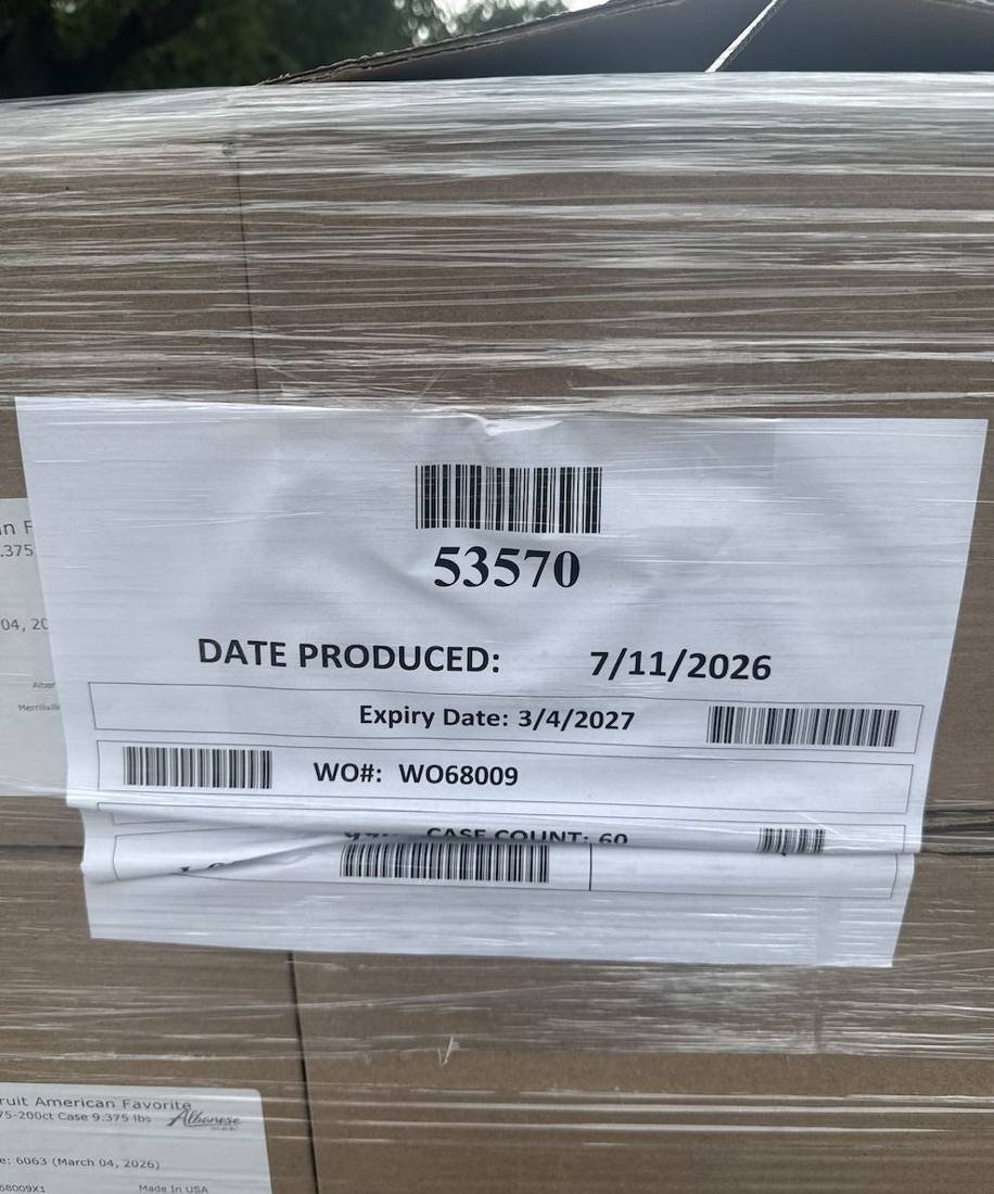 Pallet label showing the case count and expiry date for a candy liquidation lot
