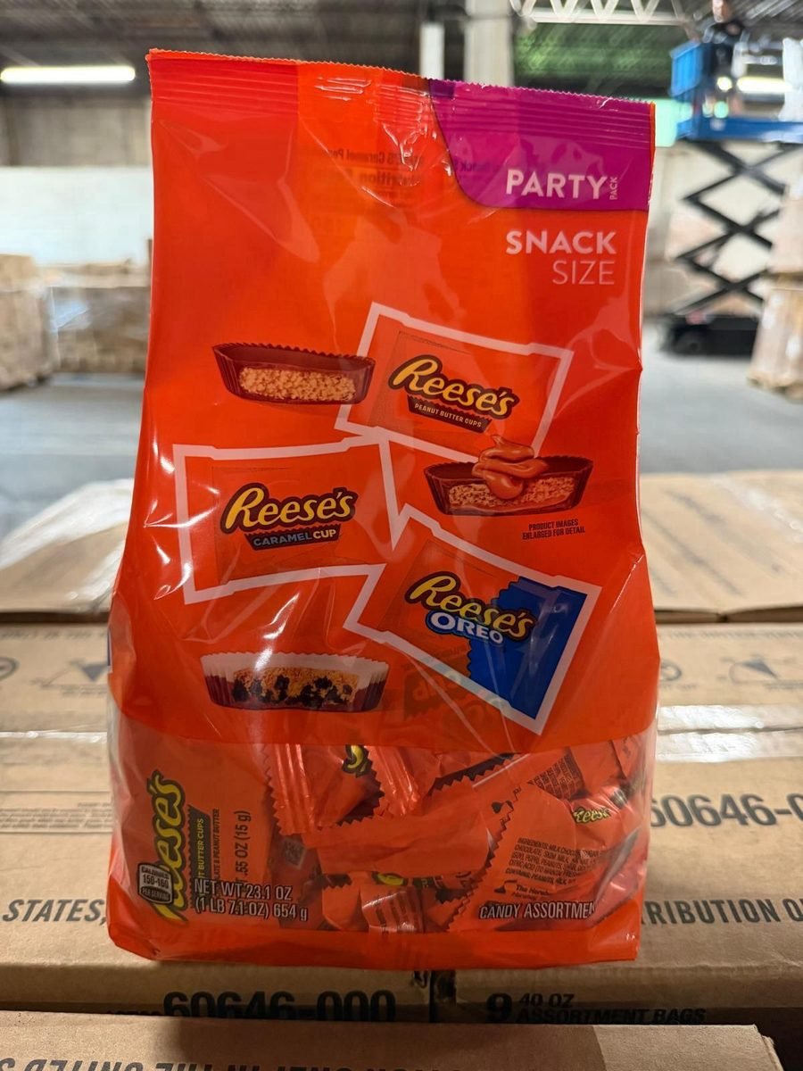 Reese's party-size snack bag on a sealed case of short-dated candy